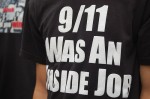 Protestor, Aiden Purcell, of Lakewood, N.J.wears a protest t-shirt with his views at the 9/11 memorial service today. Photo by Kait Richmond