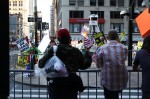 Vistors watch Westboro Baptist Chuch protest the 9/11 memorial service. The church believes the attack was an act of God. Photo by Nicole Guzzardi