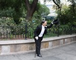 Lulu Lolo also known as The Gentleman of 14th Street,” tips her hat and wishes a good day to passersbys on 14th street. Photo by Nicole Guzzardi..