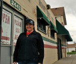 Tammy Alfaro-Koehler, owner of Honey Bee Market La Colmena, stands outside her business on Bagley Street. Alfaro-Koehler's grandfather opened the Hispanic market in 1956. Photo by Kathryn Kattalia