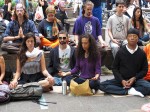 Business magnate Russell Simmons (bottom right) participates in a meditation sit during Occupy Wall Street protests in Lower Manhattan's Zuccotti Park  (Photo by Louie Lazar)