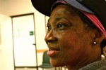 Veronica Green, 53, waits for her medications during Thursday night clinic hours at the Cabrini Clinic in southwest Detroit, a free health care provider. Unemployed and uninsured for over a decade, Green relies on food stamps to live. She is well known at the clinic as a long-time patient. Photo by Meredith Bennett-Smith