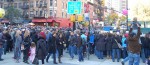 Crowds swell at the Queensboro Bridge where NYC Marathon runners will take their first steps into Manhattan. Photo by Kait Richmond.