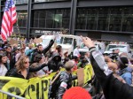 The first wave of Occupy Wall Street protestors returned to Zuccotti Park this morning, after being evicted by police last night. Photo by Chris Palmer