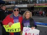 Jack, left, and Barbara Solomon stand along Crescent Street in Queens, waiting for their son Bill, a first time marathoner at age 50. Photo by Chris Palmer