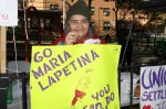 Raquel Mendez, 75, of East Harlem at the NYC Marathon waiting for her friend Maria Lapetina to cross the 19th mile so she can cheer her on.  Photo by Ebony Montenegro