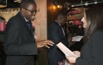 Jaimel Greene speaks with a potential employer at Wednesday's job fair. Photo by Reuben Jones.