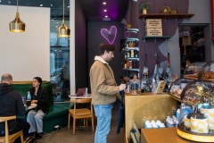 September 18, 2022- Brooklyn, New York. Chase orders his morning coffee at his favorite coffee shop Coffee Uplifts People. He is greeted by the cashier with a hug and they make  small talk.