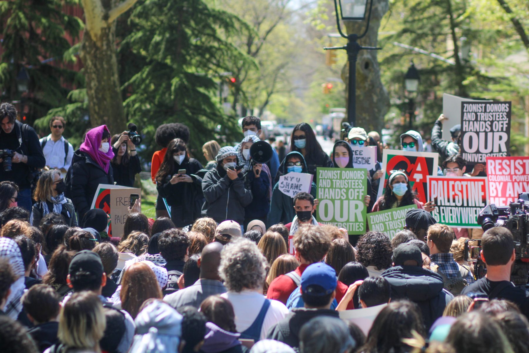 The NYU Palestine Solidarity Coalition’ held a strike and walkout in Washington Square Park on Tuesday. Hundreds of Pro-Palestine supporters gathered for the rally, which marks day two of protests at NYU after Monday’s encampment in Gould Plaza ended with 150 students and faculty members arrested by the NYPD. (Photography by Jordan D. Brown)