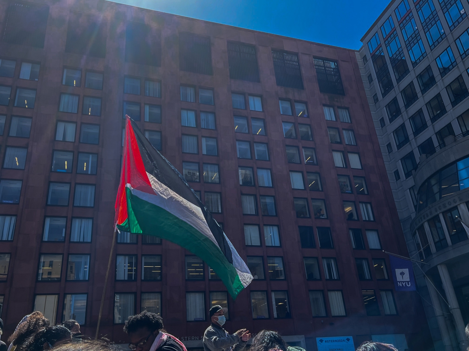 Several dozen NYU students occupied Gould Plaza on Monday, in front of the NYU Stern School of Business, in protest of the continued war in Gaza and NYU's connections with Israel. (Photography by Ryan Schwach)