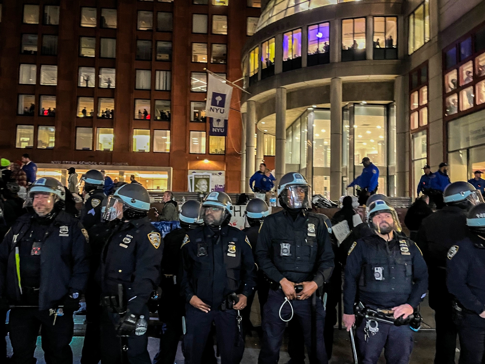 By 8:30 p.m., NYPD officers moved in the back of Gould Plaza via West 3rd Street, and announced over a loudspeaker that if protestors did not leave the plaza they would be arrested for trespassing. (Photography by Ryan Schwach)