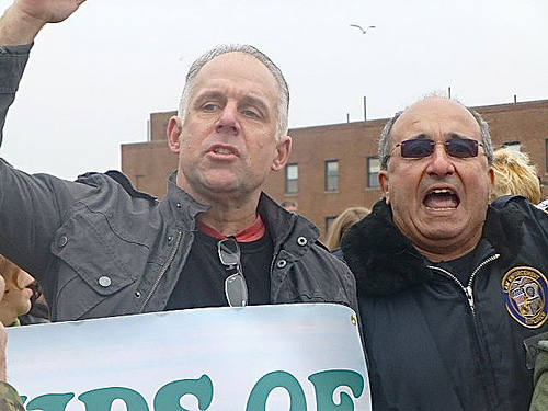 John Cori, left, with 100th Precinct Community Council President Danny Ruscillo Jr., pictured right, at a Friends of Rockaway Beach rally in December in Rockaway Beach pushing for the installation of more rock jetties along the Rockaways southern shoreline. Cori formed the advocacy group for residents to voice their opinions about restoration efforts to state and local officials. Photo courtesy of Friends of Rockaway Beach.
