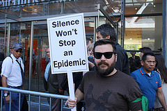 Josh Tocco representing his wife and brother-in-law at a Lyme disease demonstration in front of the New York Times building. in midtown, Manhattan. Photo Credit: Ben Shapiro