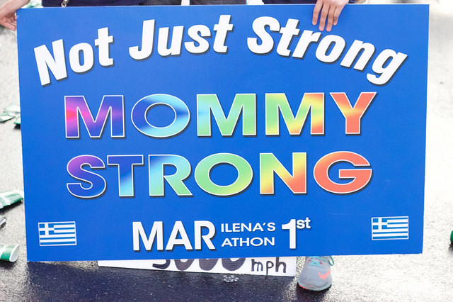 The Glyptis always carry a "Mommy Strong" sign to show support for Marilena whenever she runs. Photo by Ugonma Ubani-Ebere