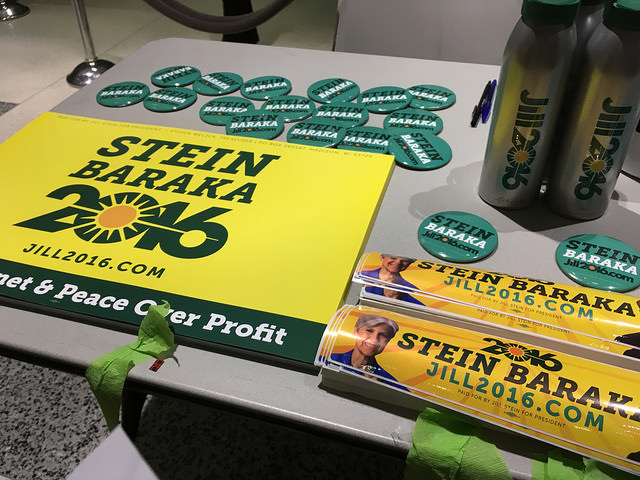 Bumper stickers, fliers, pins and other campaign paraphernalia lay on a table in the lobby of the Hostos Community College arts center in the South Bronx during a Jill Stein rally yesterday. Around 150 people rallied in support of the Green Party at the college's arts center where Stein pitched herself as an alternative to the Republican and Democratic candidates for the presidency. Photo by Razi Syed. 